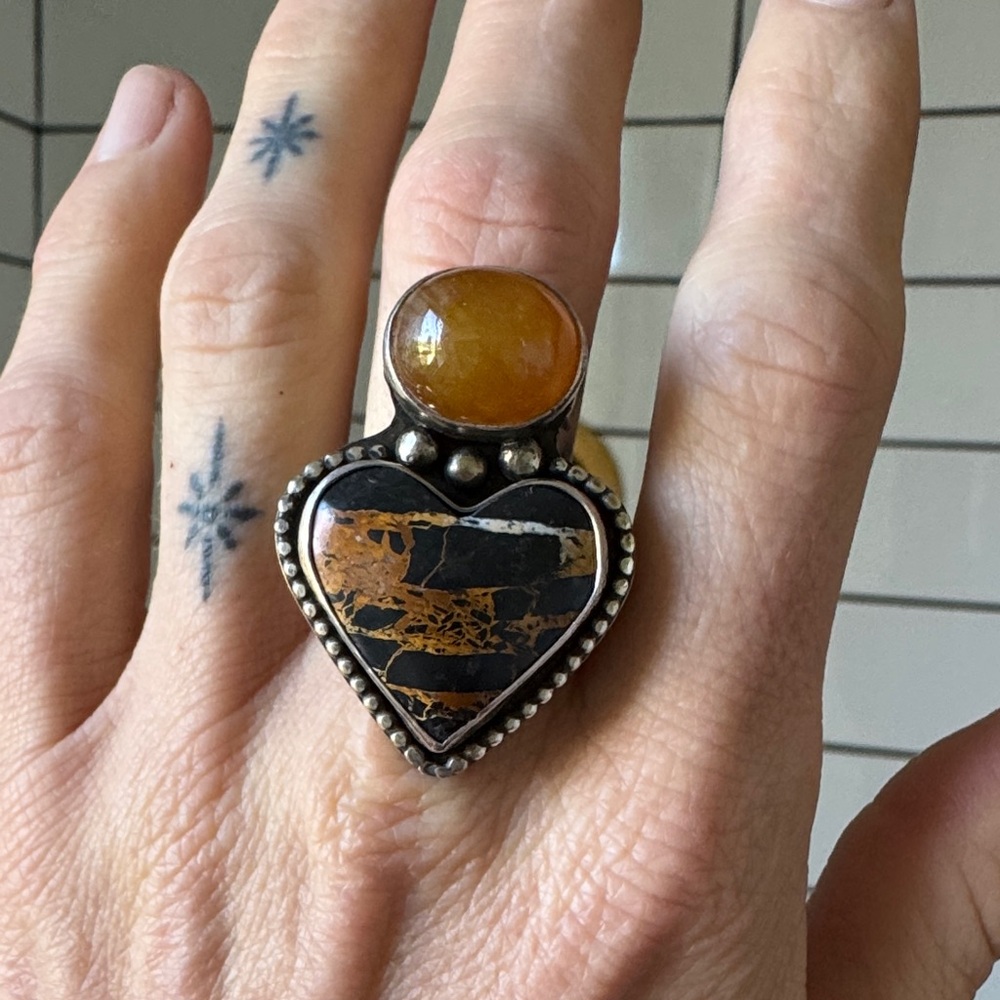 Heart-Shaped Black and Gold Ring